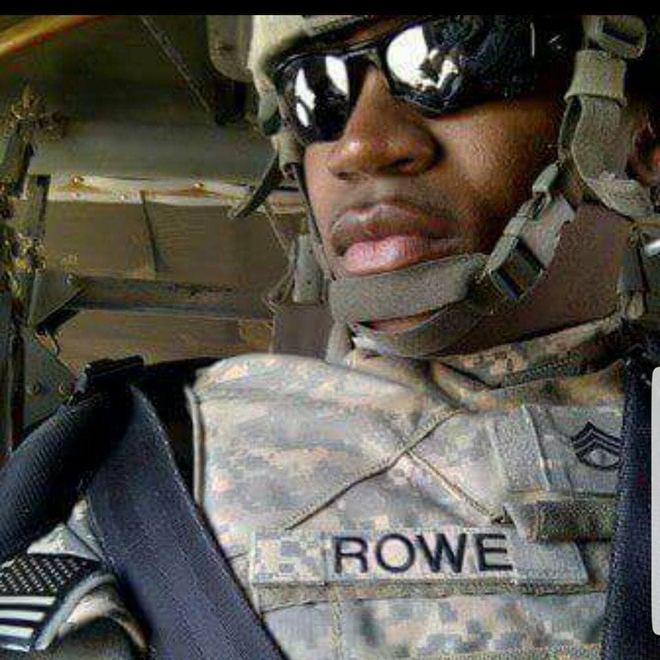 Raoul Rowe in helicopter during service